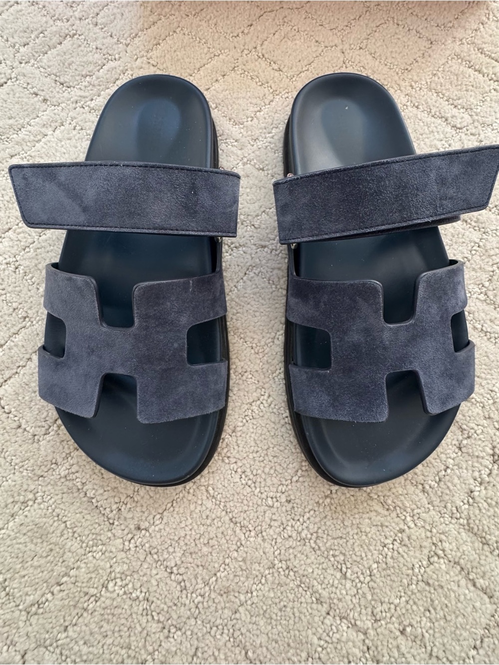 Hermes Women’s Chypre navy suede sandals.